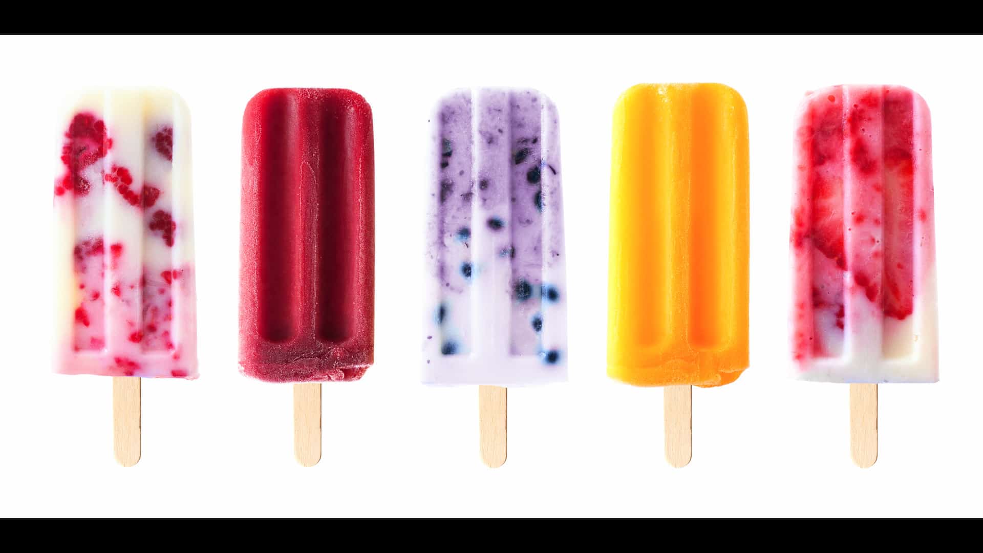 colorful fruit popsicles in a row
