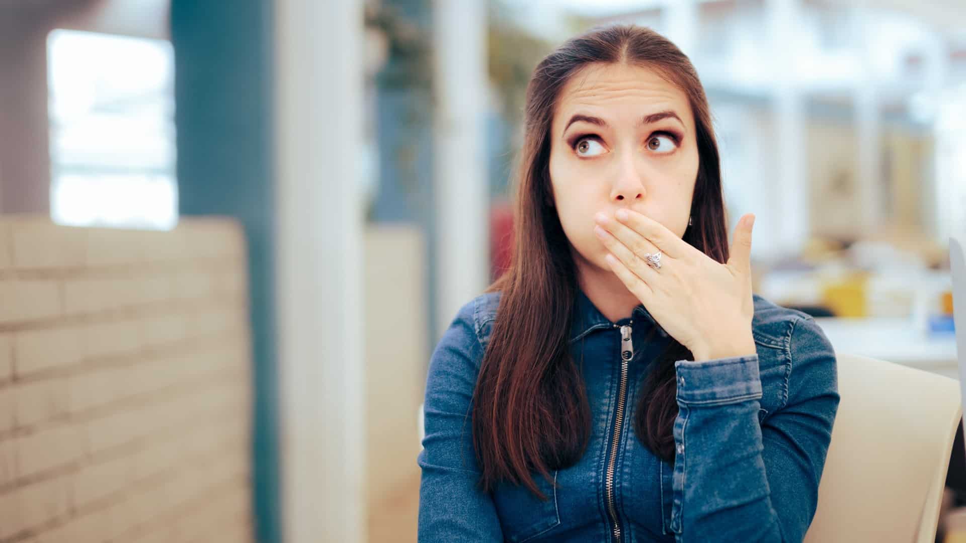 woman burping after eating
