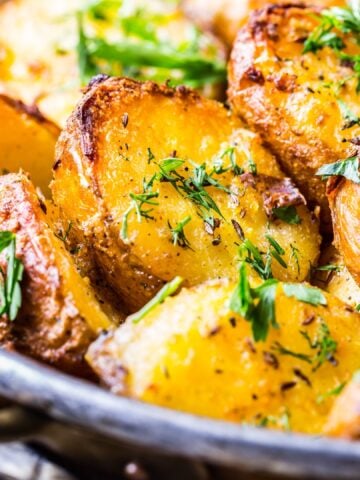 Roasted Potatoes with herbs in a pan
