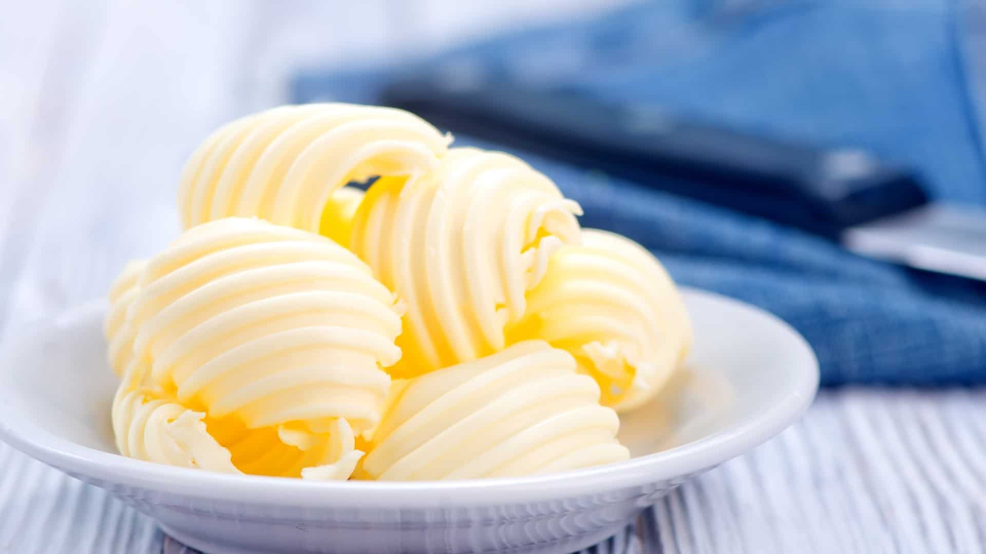 Butter curls in a white bowl
