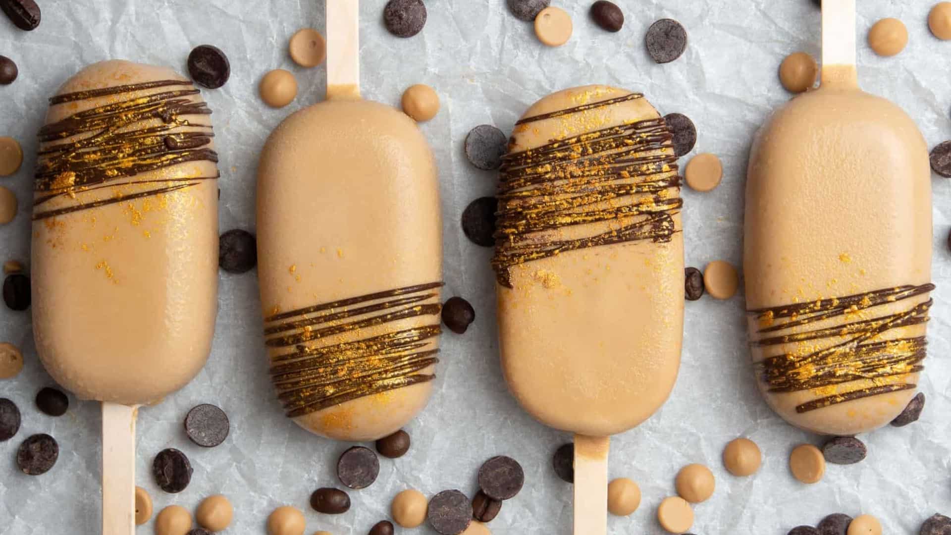 Coffee caramel ice cream bars on gray background