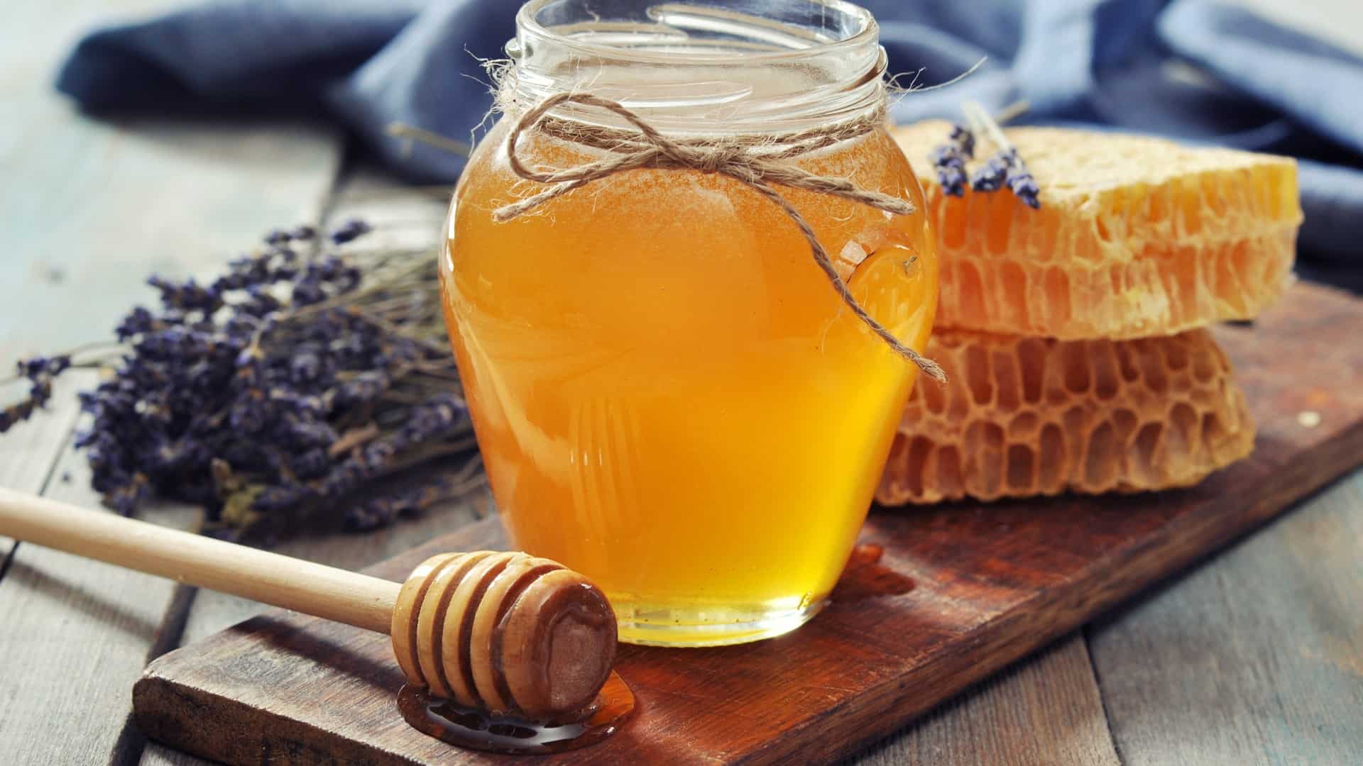 honey in a clear glass jar