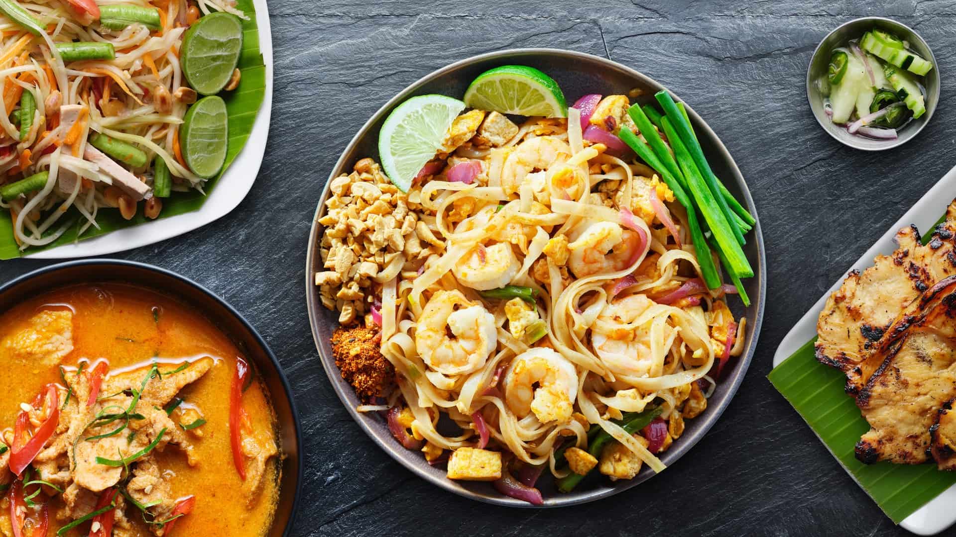 Thai food on a grey table