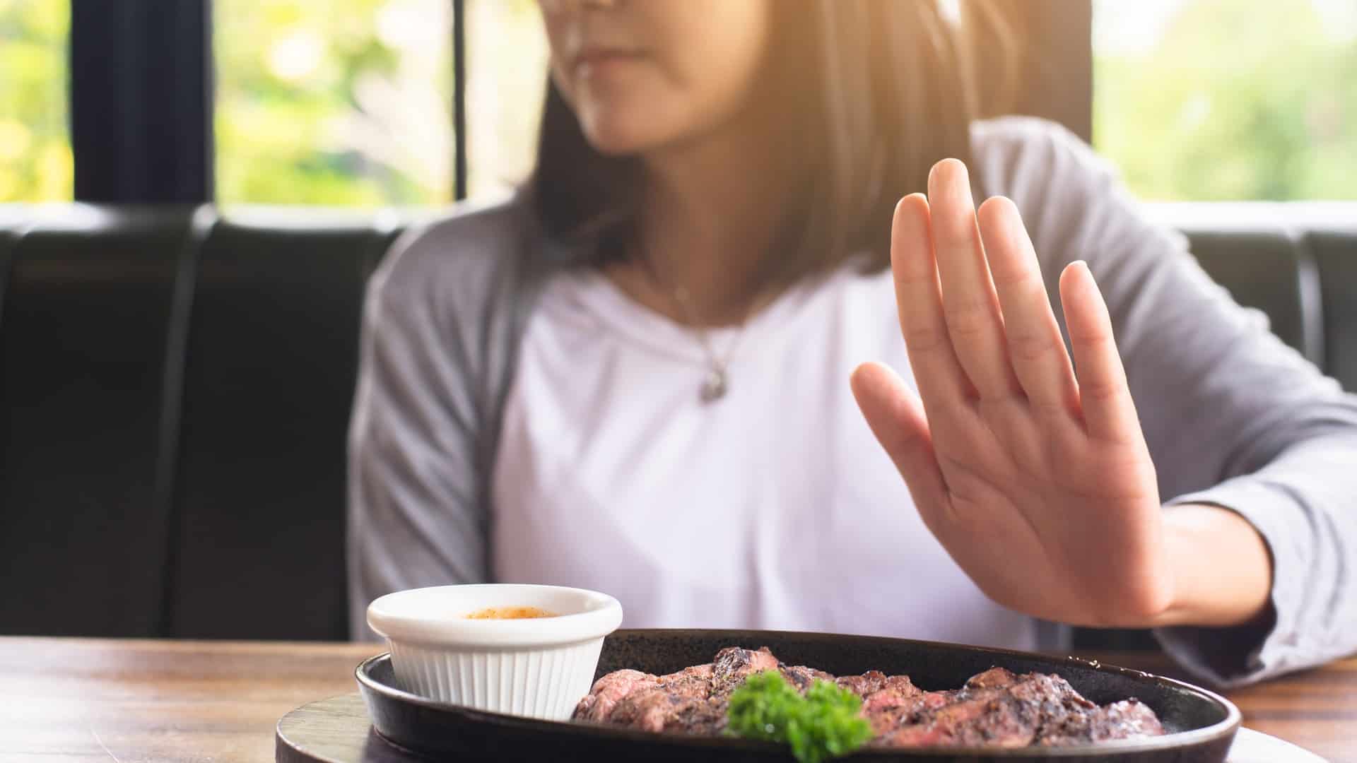 Woman refusing meat
