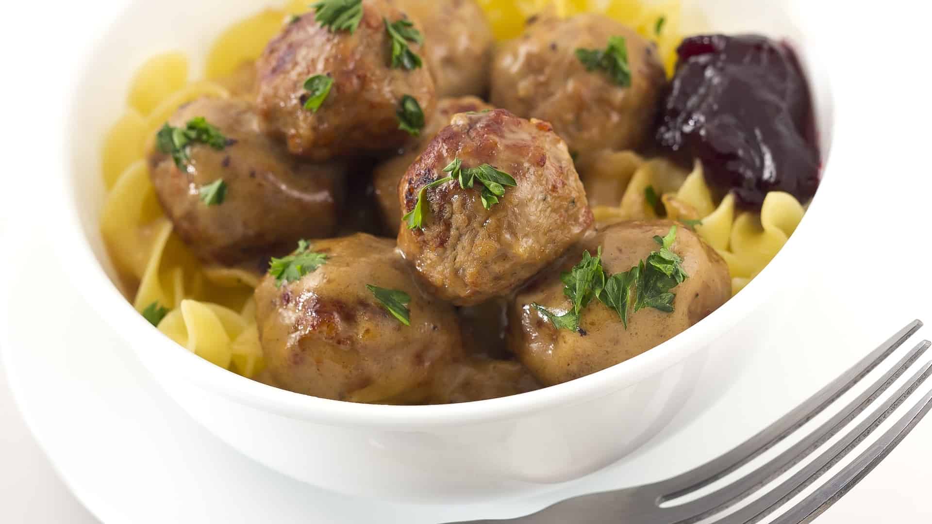 Bowl of meatballs with a grape jelly dip