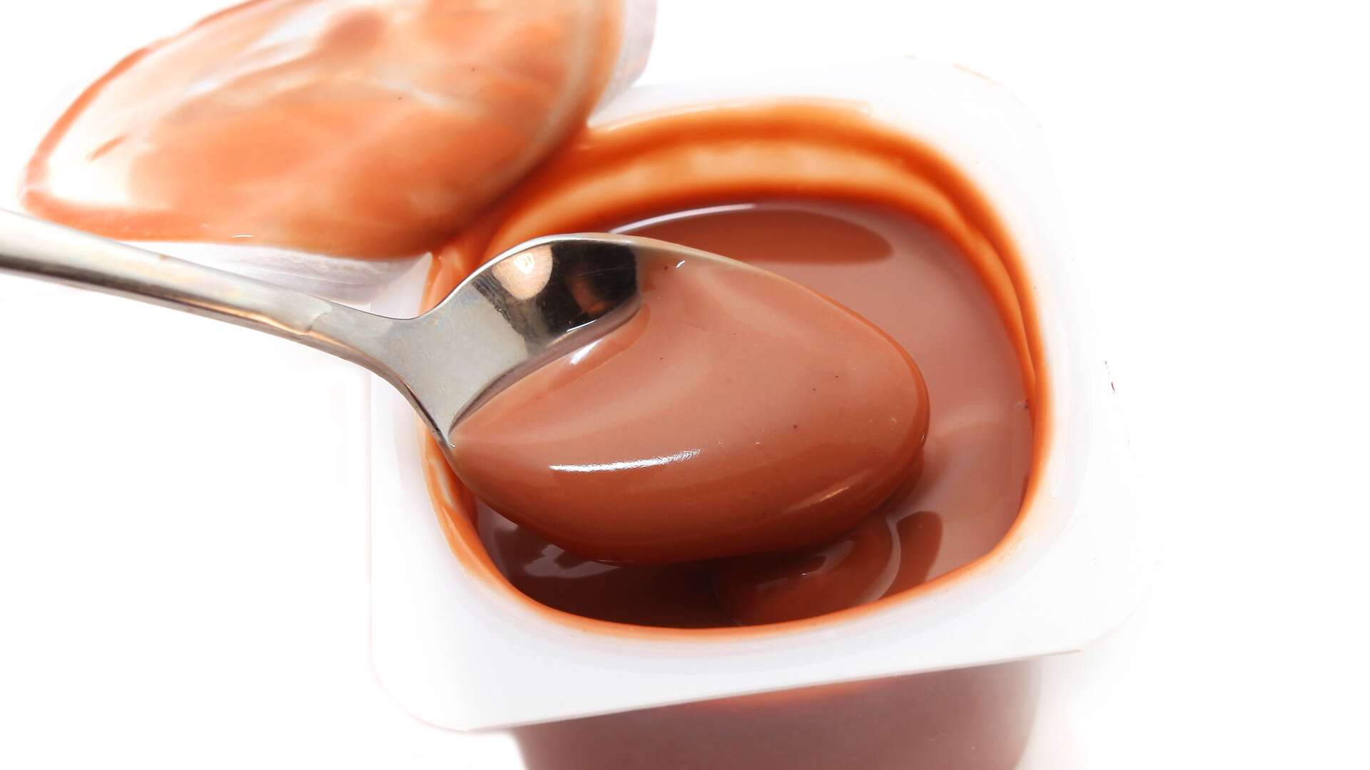 chocolate pudding cup with spoon