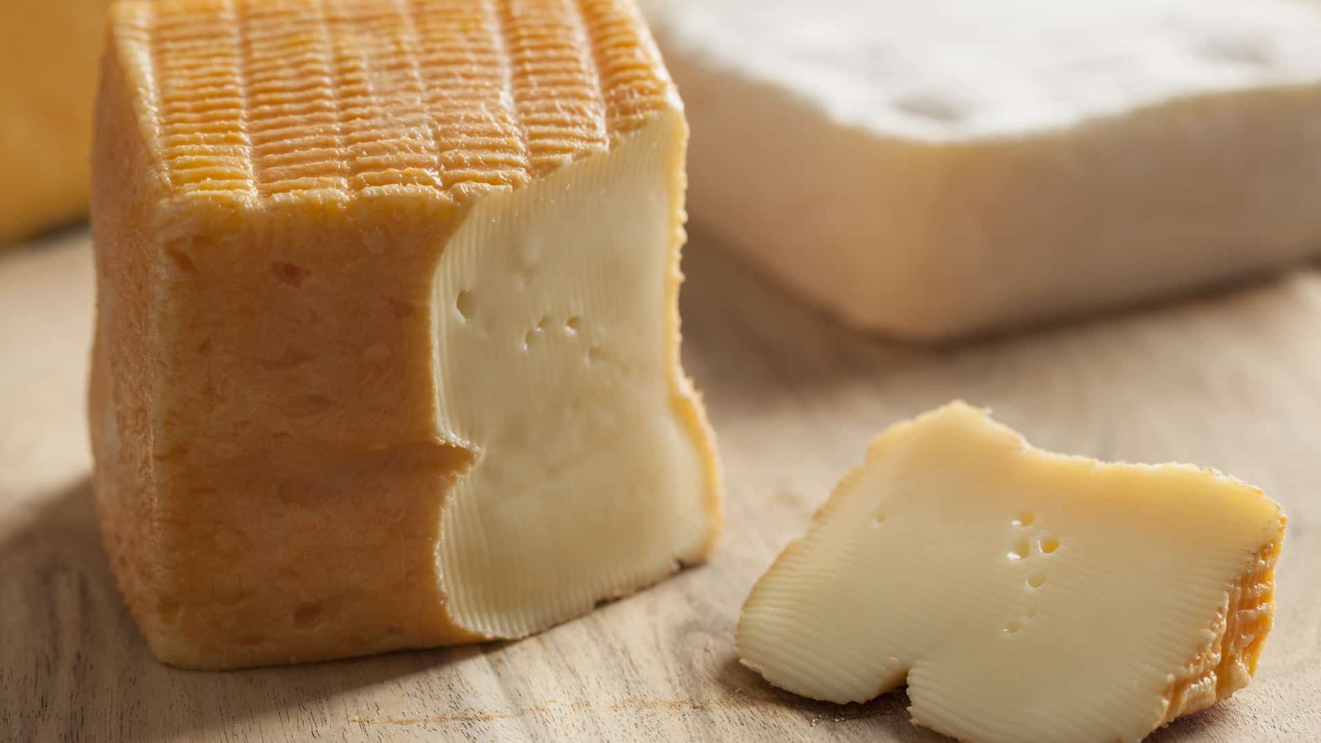 Limburger cheese block with a slice