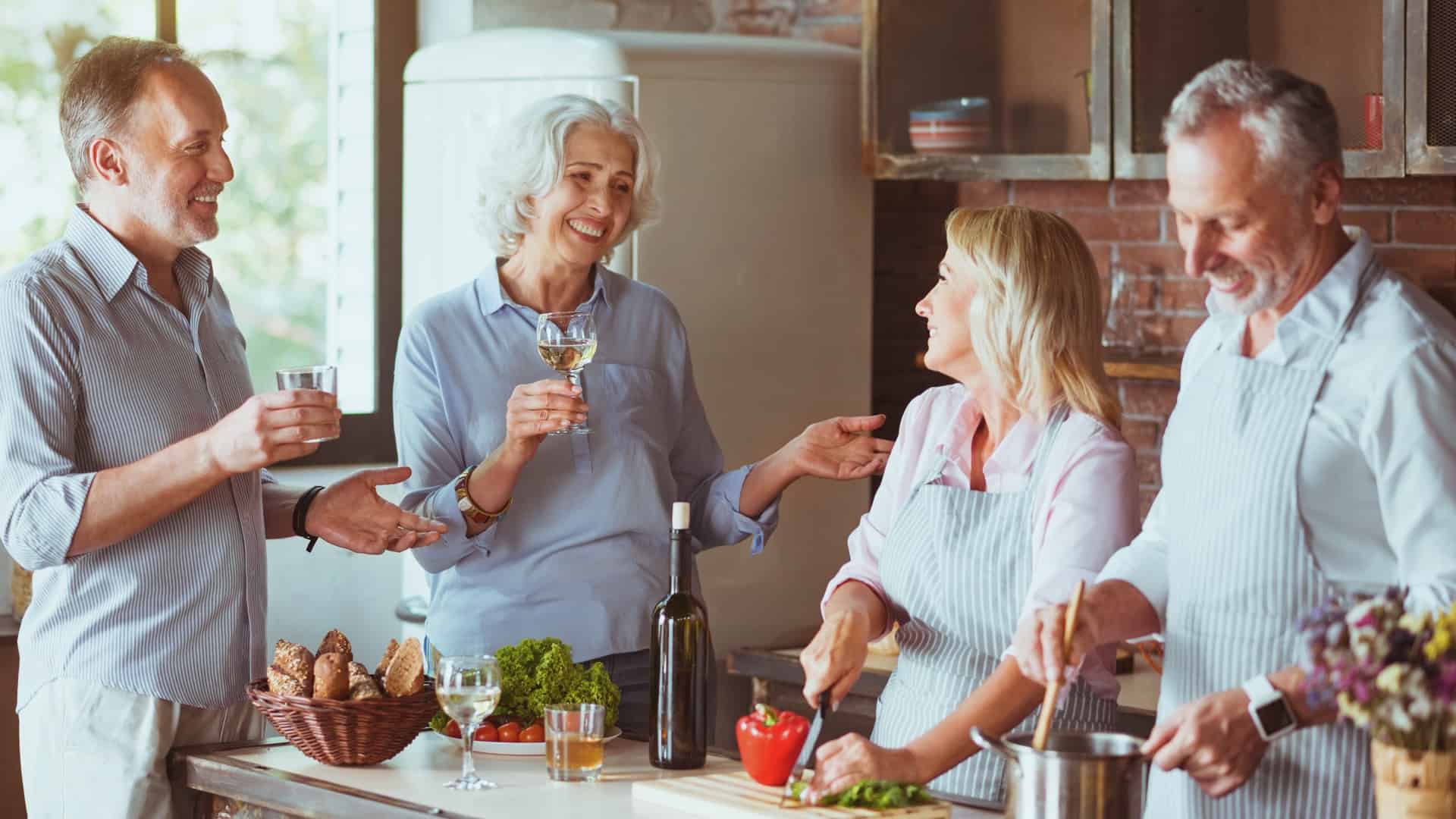 Baby boomers cooking with friends