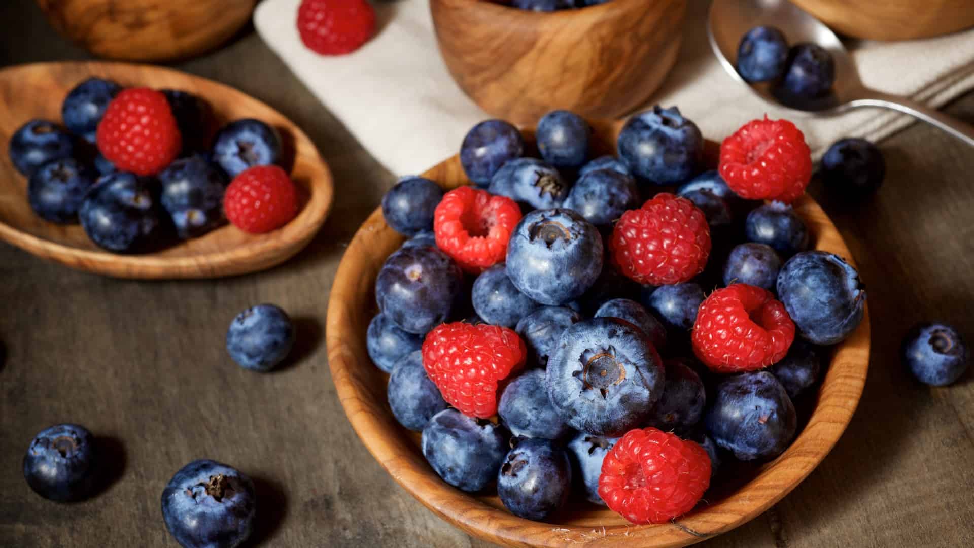 Bowl of berries with a spoon