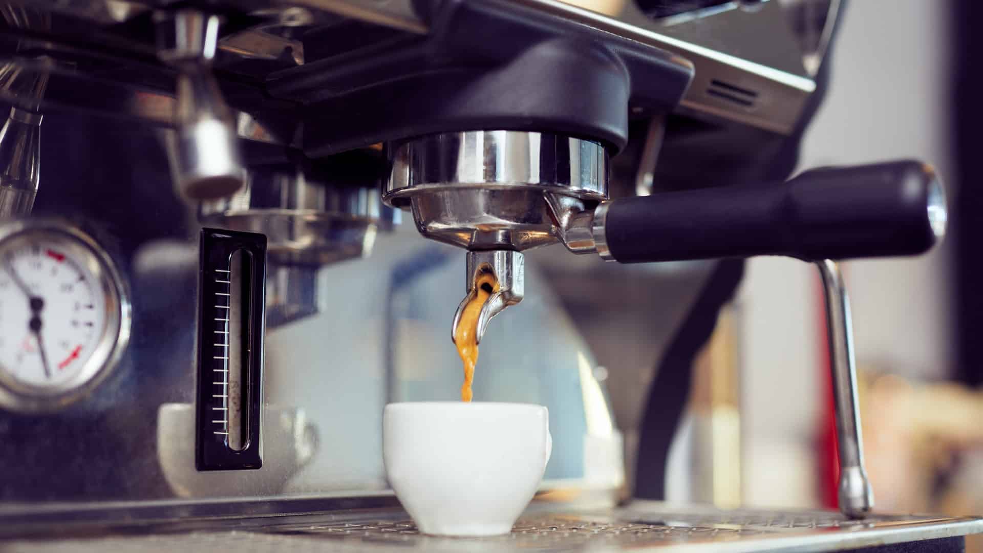 espresso shot being pulled from espresso machine