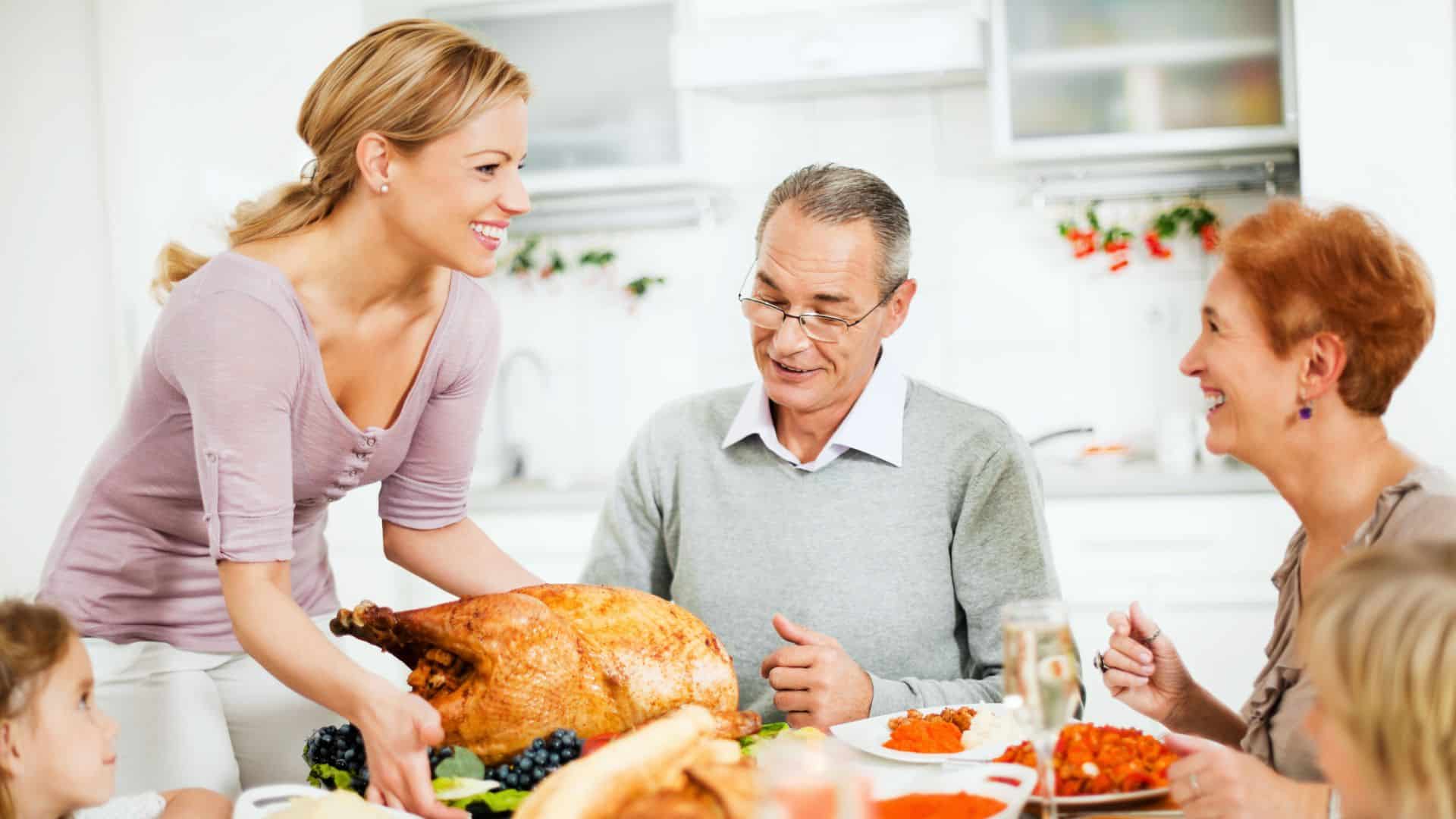woman serving turkey