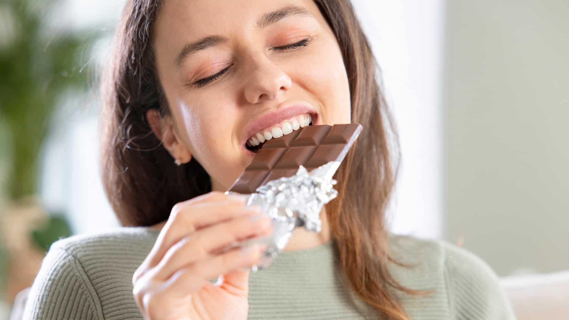 Woman indulging in chocolate