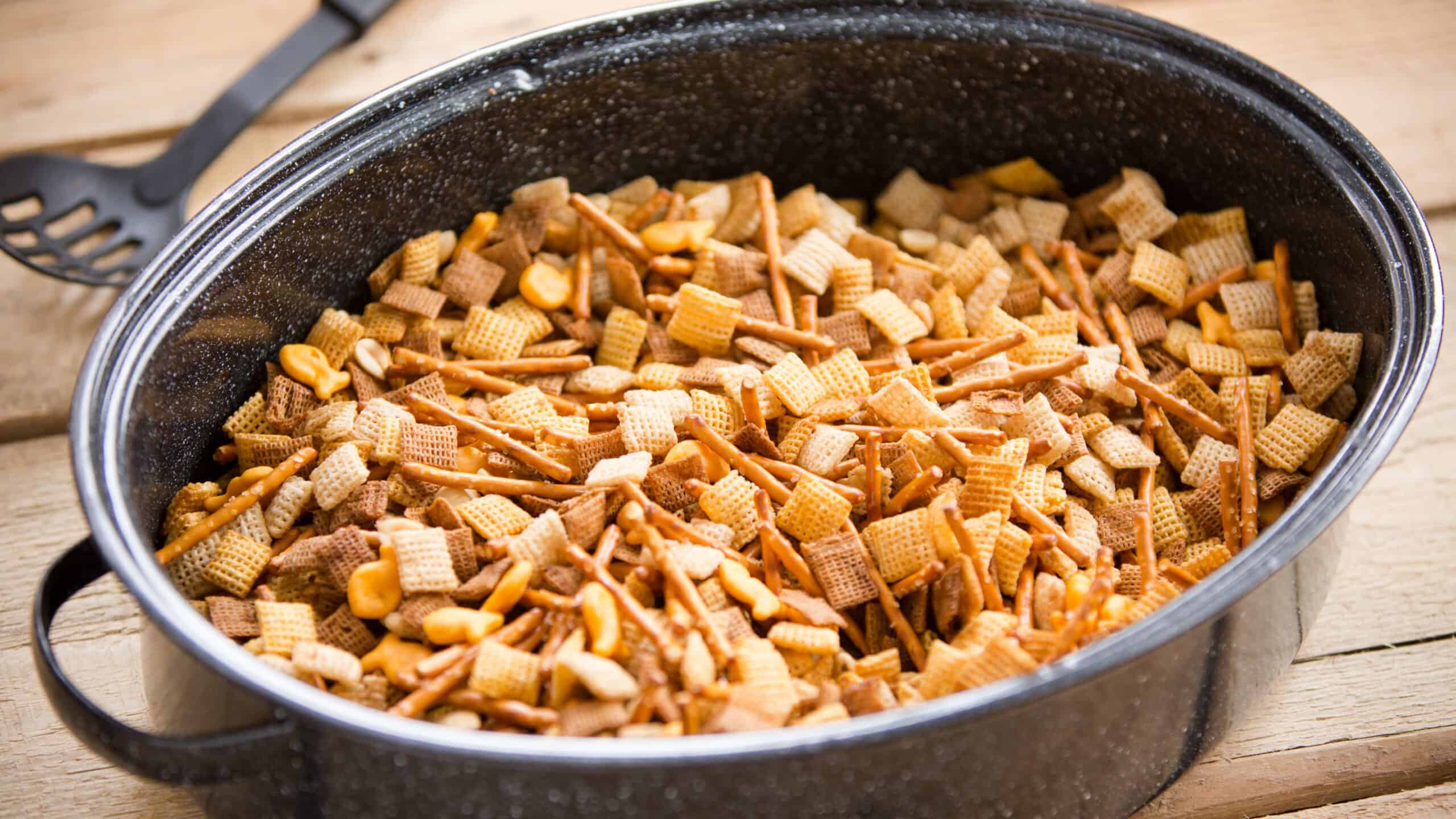 Homemade chex mix in a large pot