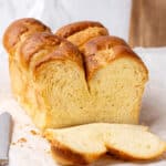 French Brioche bread on a cutting board.