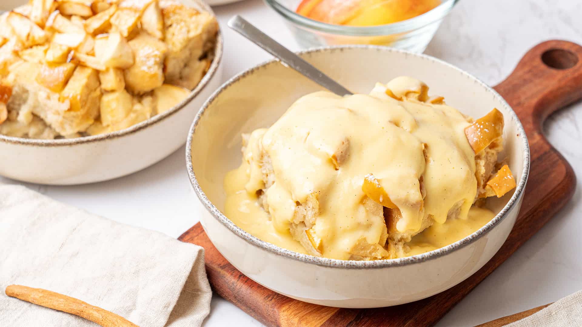 Apple bread pudding on a plate.