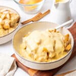Apple bread pudding on a plate.