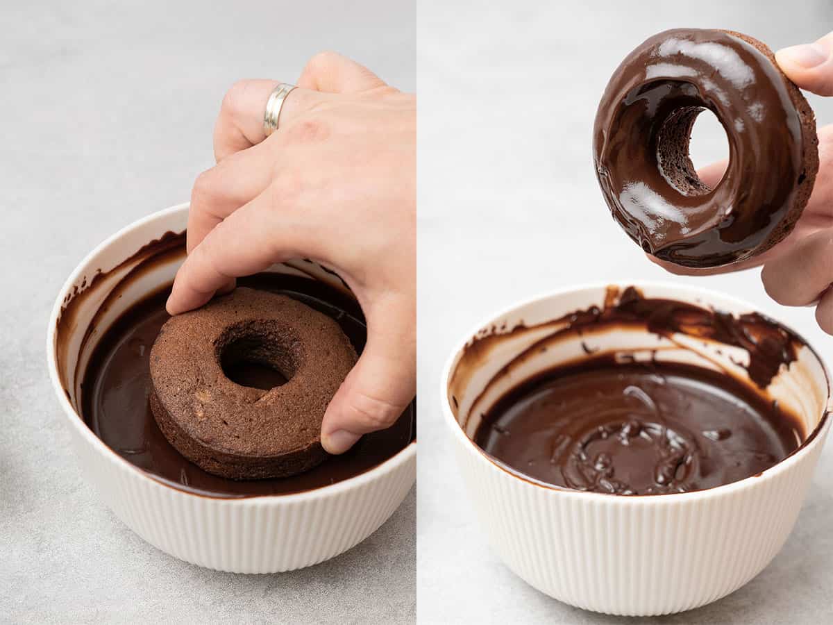 Dipping a donut into chocolate glaze.
