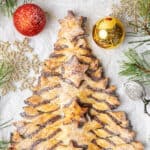 Nutella puff pastry Christmas tree in a baking paper.