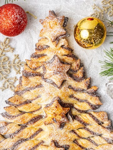 Nutella puff pastry Christmas tree in a baking paper.