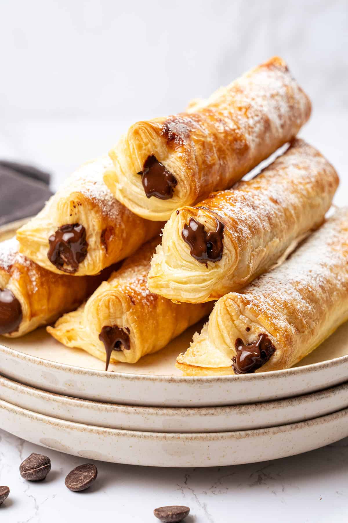 a few chocolate puff pastry on top of each.