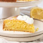 a slice of Italian Lemon Ricotta Cake on a plate.