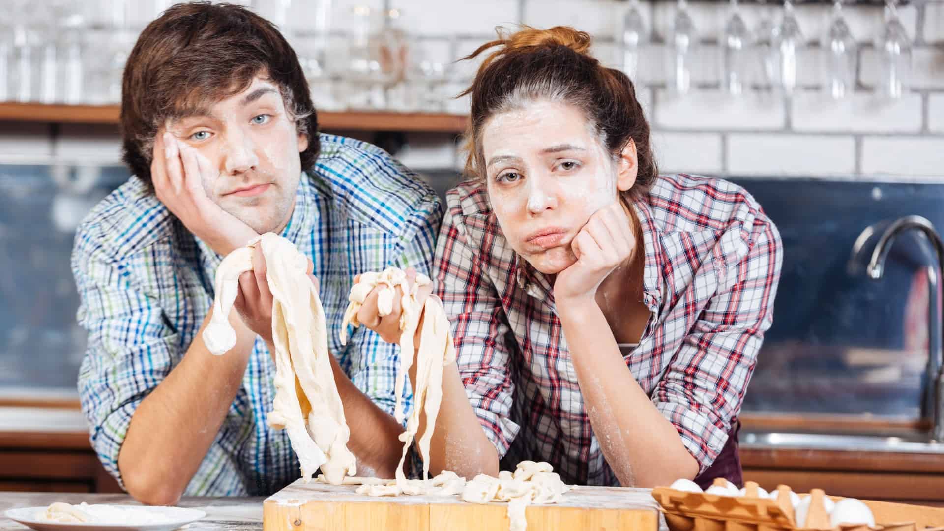 couple in a mess from baking