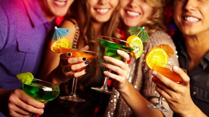people drinking alcohol at a bar