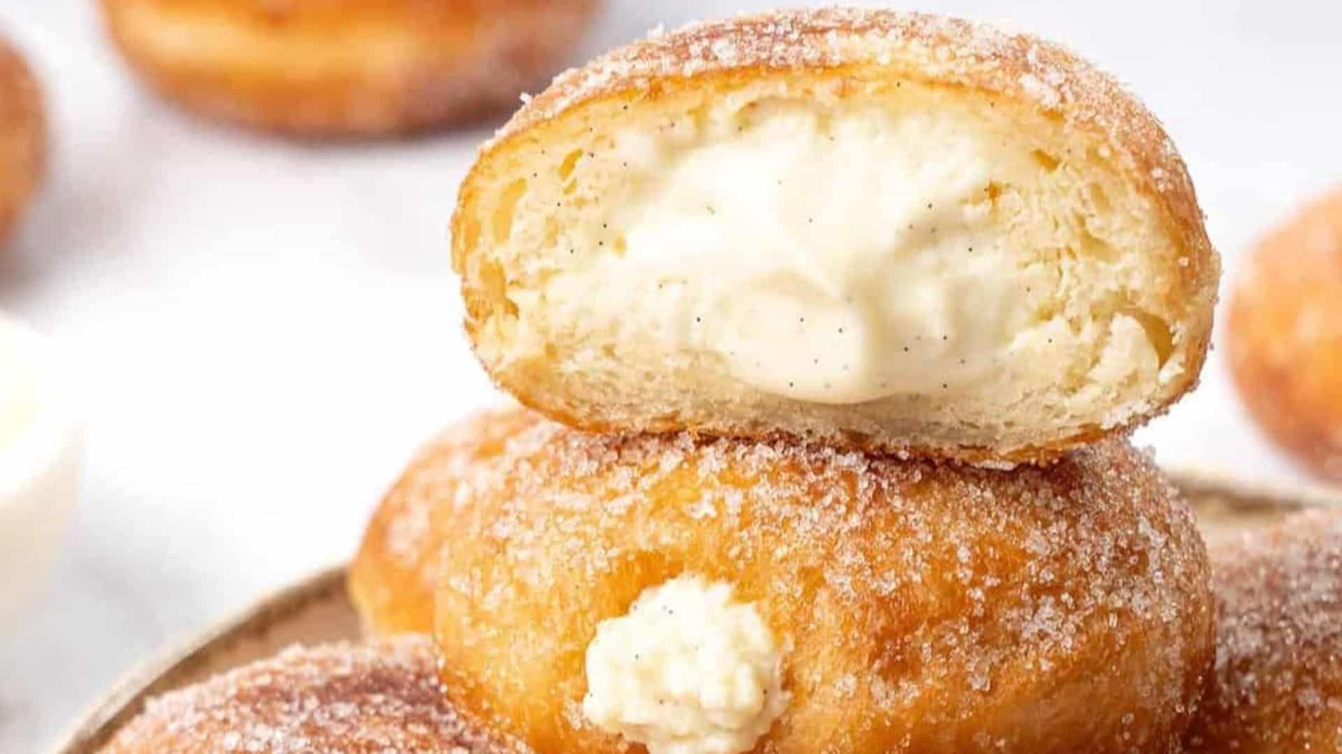Bavarian cream donut split in half