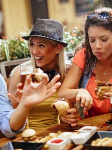 Friends eating in a fast-food.
