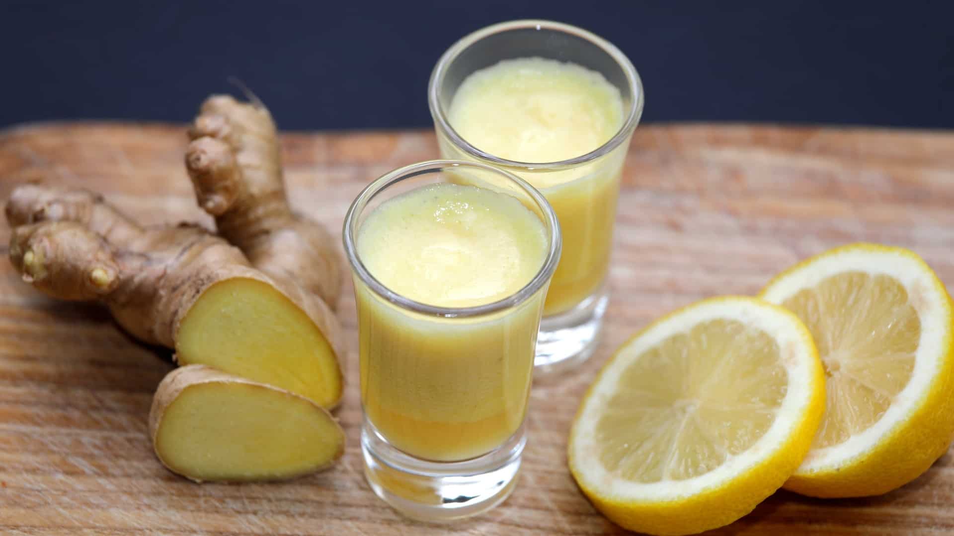 shot glasses of ginger and lemon juice