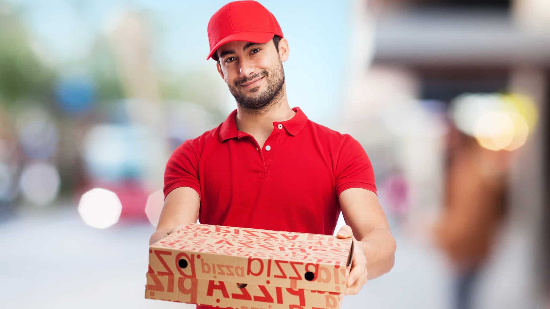 pizza delivery guy with pizza boxes