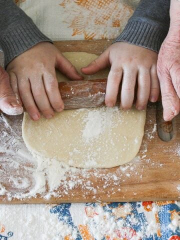 grandma cooking with grandchild