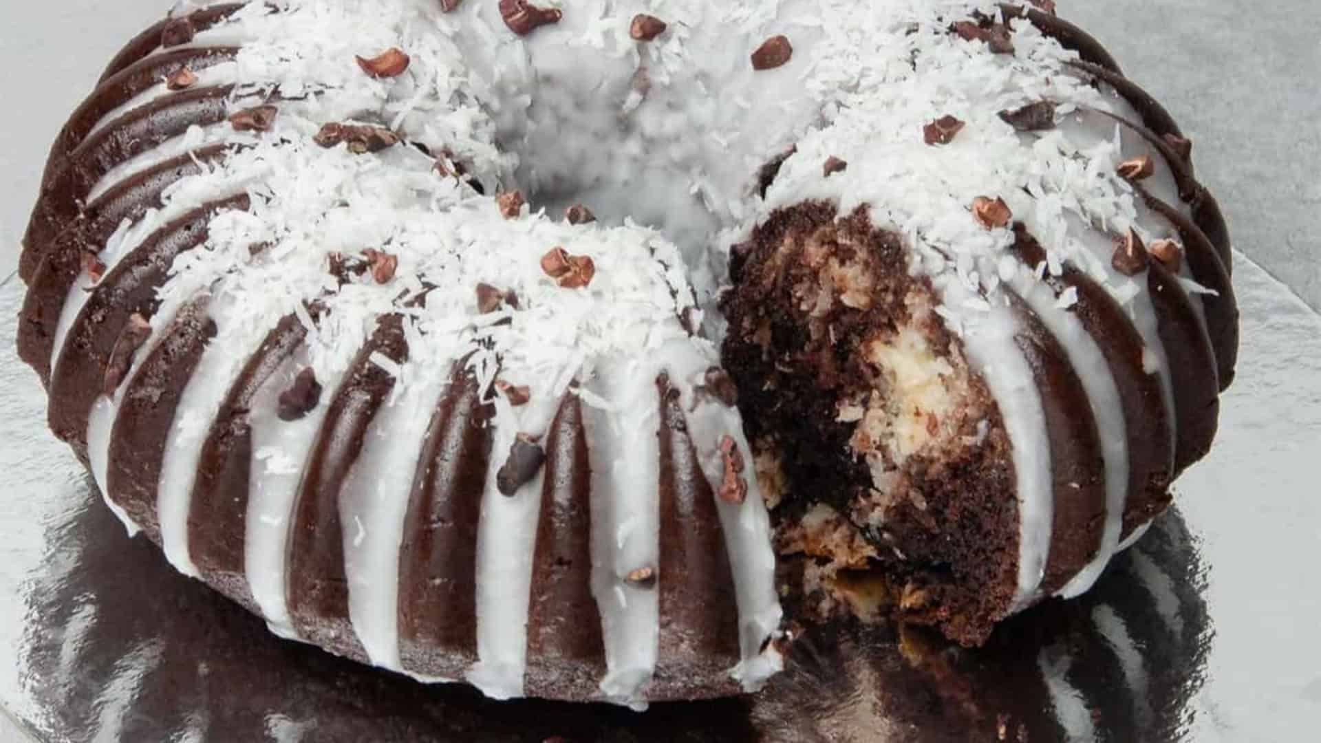 coconut chocolate bundt cake on a silver tray