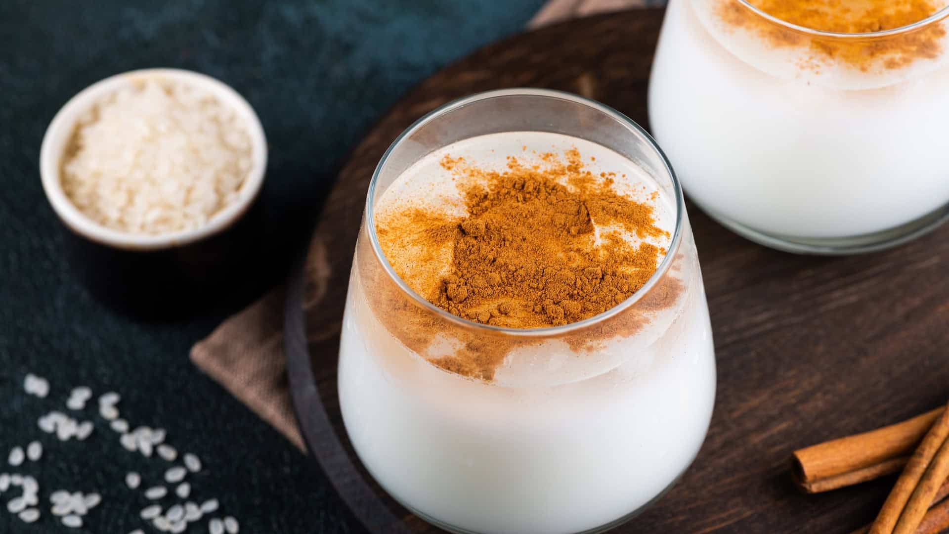 glass of horchata with cinnamon on top