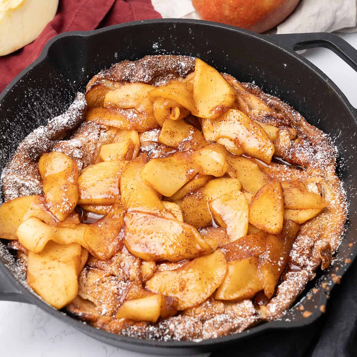 Apple Dutch Baby in an iron skillet.