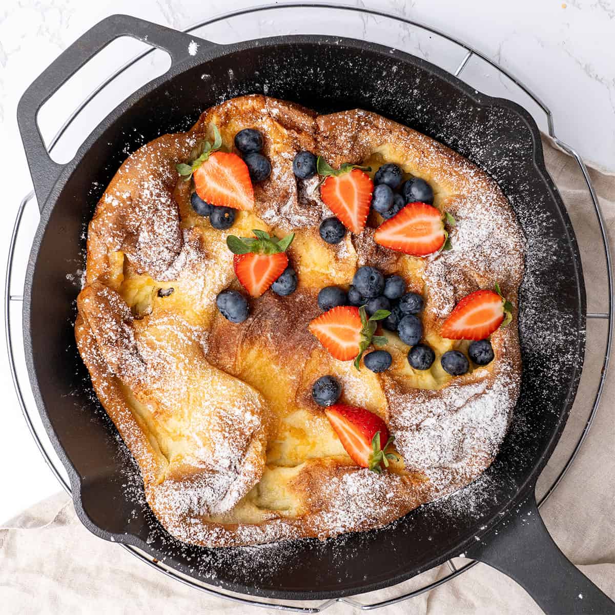 Dutch Baby pancake in a skillet.