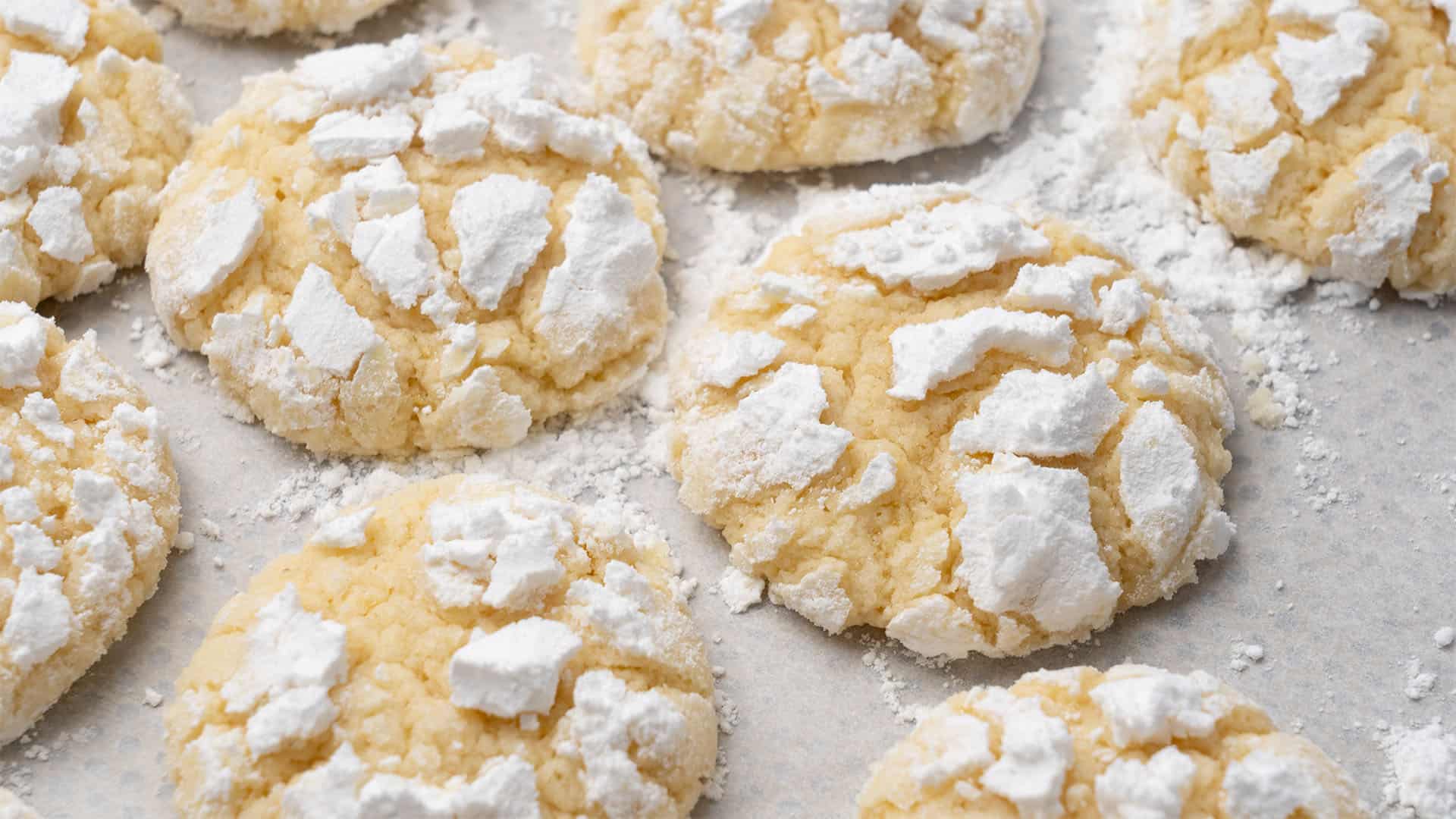 Lemon crinkle cookies on a plate.