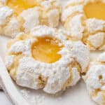 Lemon curd cookies on a plate.