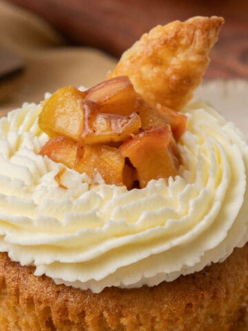 apple pie cupcakes on a cutting board.