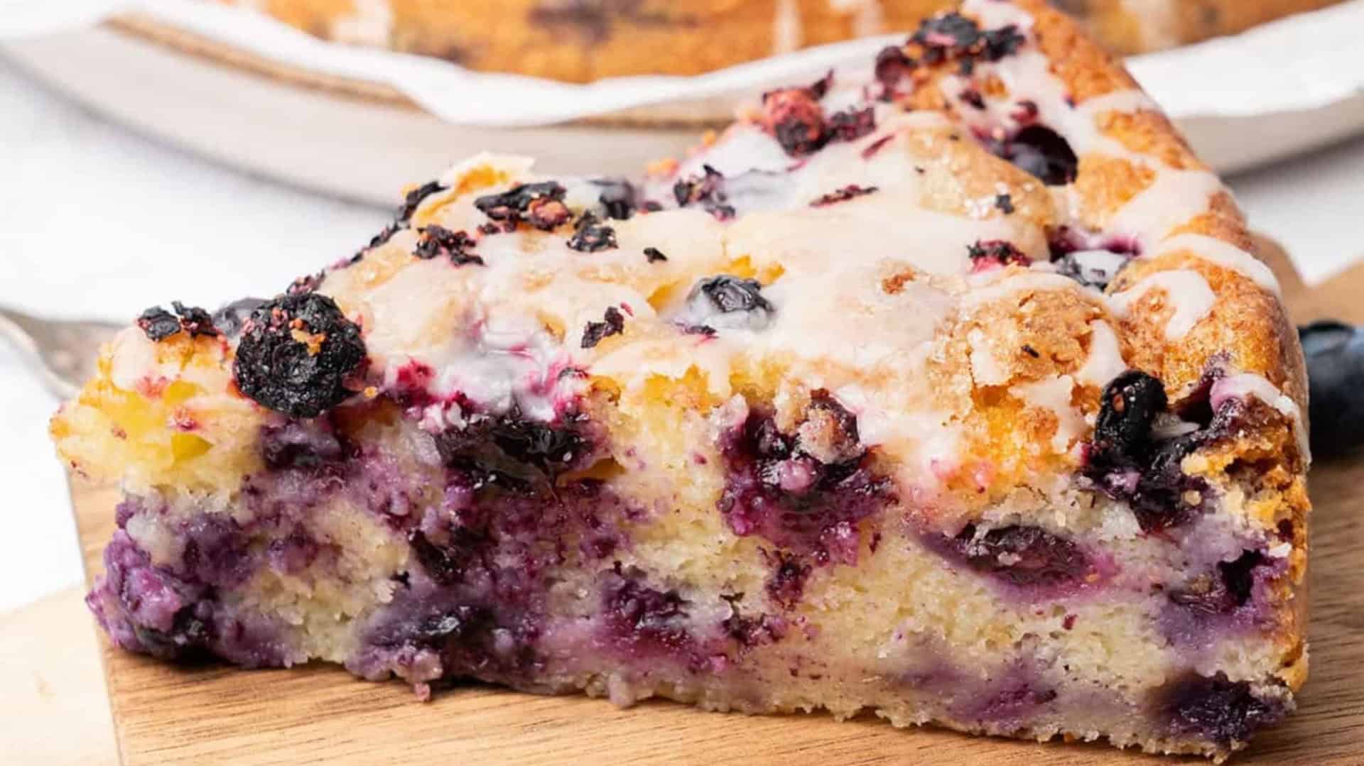 Blueberry ricotta cake slice with icing