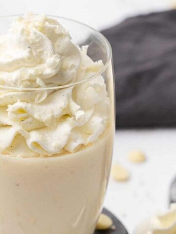 white chocolate mousse cups with whipped cream