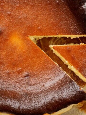 basque burnt cheesecake with a slice taken out