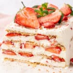 Strawberry Icebox Cake on a cutting board.