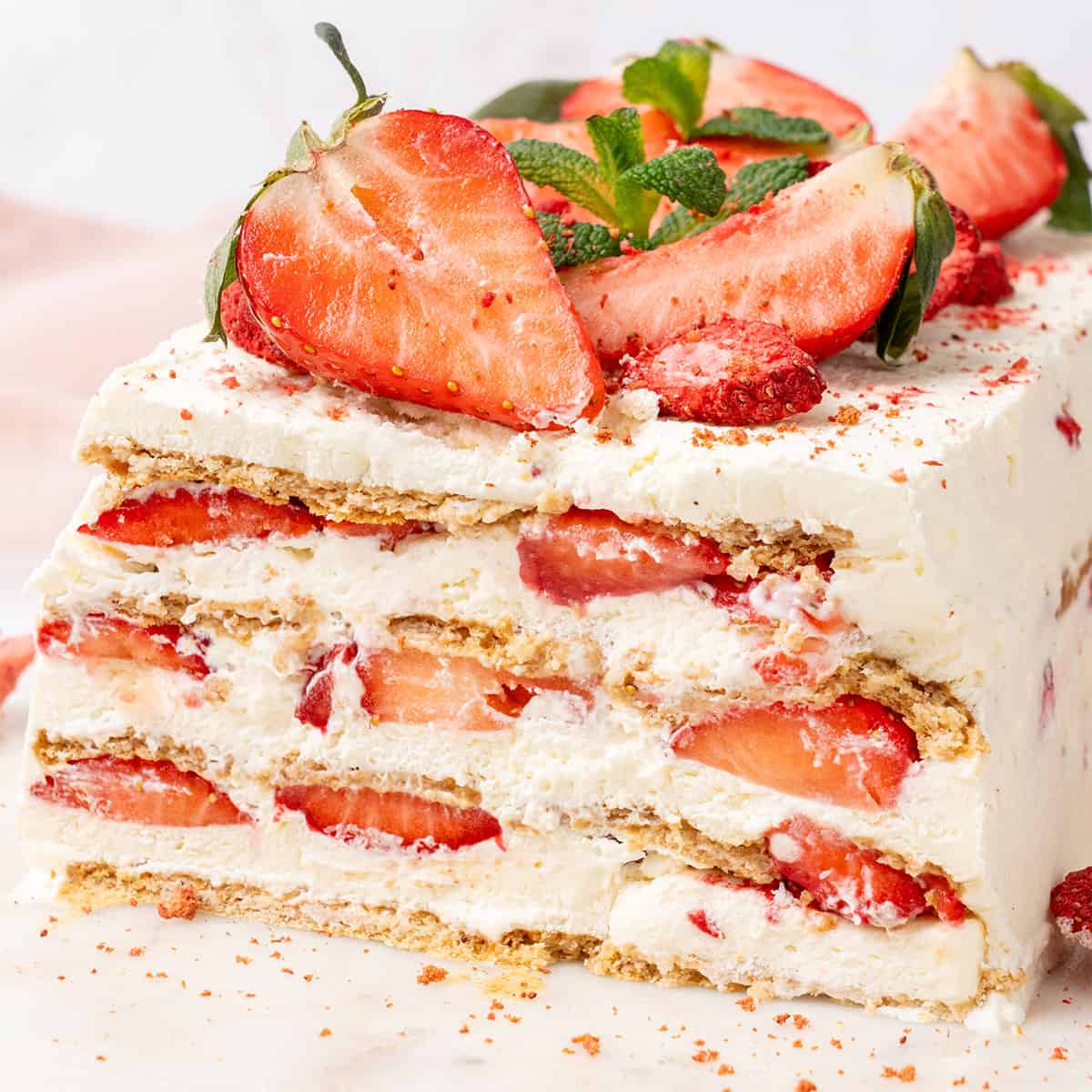Strawberry Icebox Cake on a cutting board.