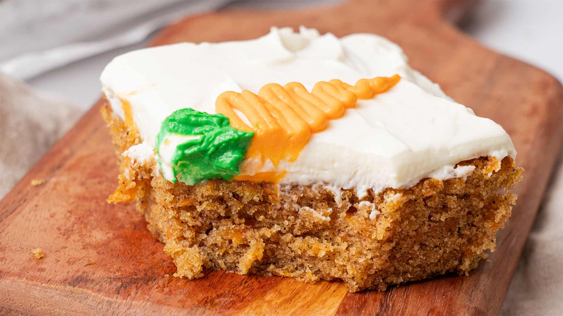 a slice of carrot sheet cake.