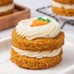 A mini carrot cake on a plate.