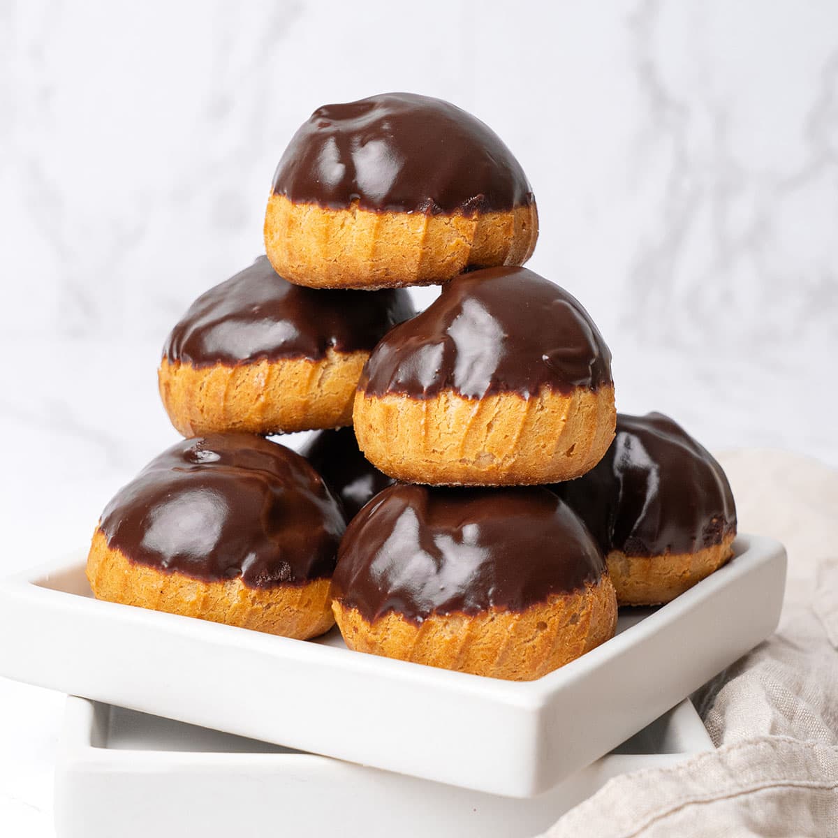 A few Profiterole on a plate.