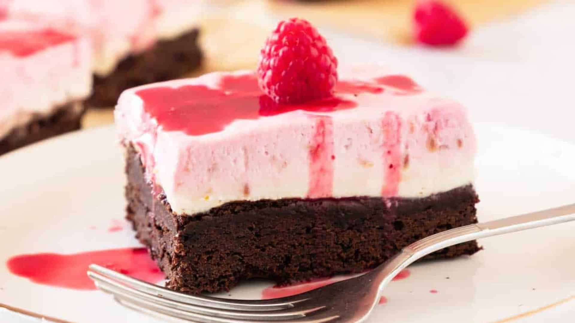 raspberry cheesecake bars with raspberry on top