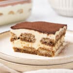 A slice of tiramisu on plate.