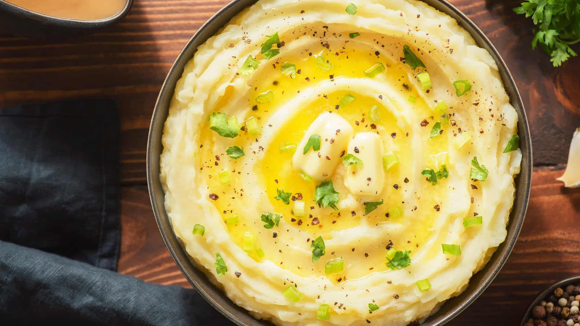 mashed potatoes in a bowl with butter